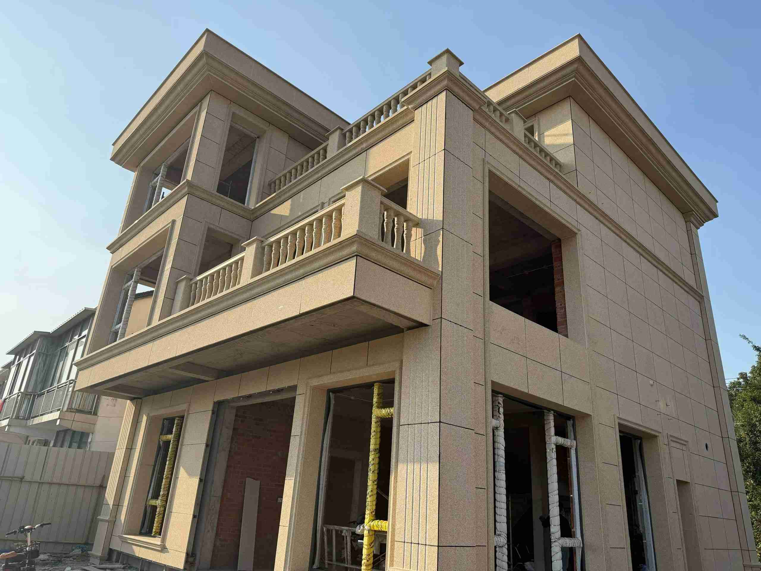 吉安 黄金麻花岗岩石材荔枝面外墙干挂效果展示